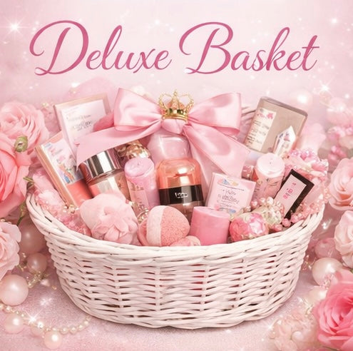 Deluxe gift basket with pink items and flowers on a pink background